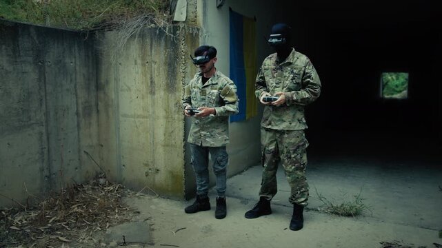 Military Drone Pilots Lower Their Goggles Near a Bunker to Bomb the Target