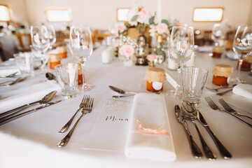 Elegant table setting for wedding celebration or holiday dinner