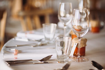 Laid table settings for a wedding reception party