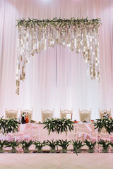 Wedding reception table setting with floral decor