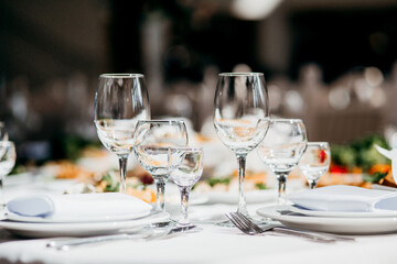 Elegant table setting preparing for wedding reception dinner