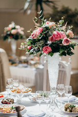 Elegant floral centerpiece on wedding reception table