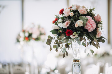 Elegant floral arrangement decorating wedding reception table