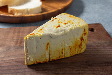 A view of a block of dairy-free smoked gouda.