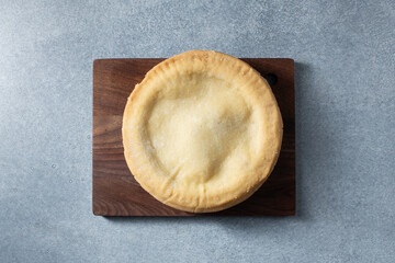 A top down view of a gluten-free, dairy-free mini cherry pie.