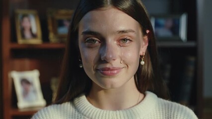 Young woman smiling with tears — bittersweet emotion cinematic portrait