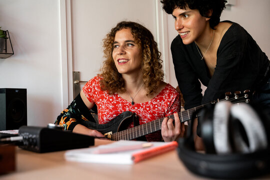 Musician Friends recording music at home studio