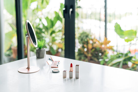 cosmetics with a mirror on the dressing table