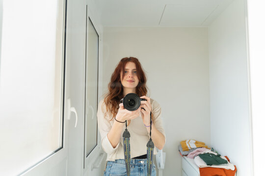Woman selfie with camera
