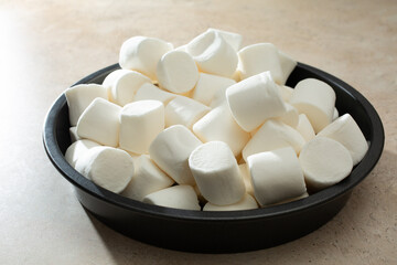 A view of a pan of marshmallows.