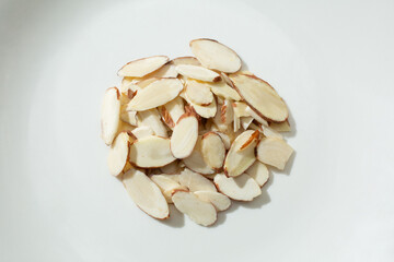 A top down view of a pile of sliced almonds.