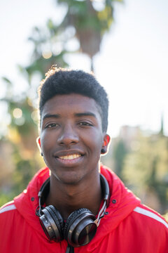 portrait of black teenage boy with headphones