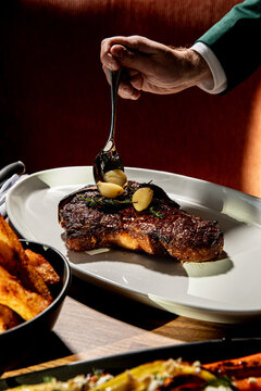 Garlic Cloves and Rosemary Steak