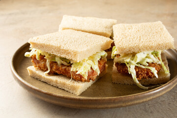 A view of a plate of gluten-free Spam katsu sandwich.
