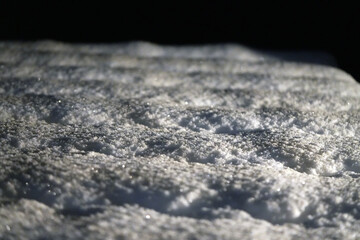 Snowy Rooftop at Night with Textured Surface