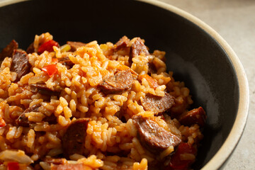 A closeup view of a bowl of jambalaya.