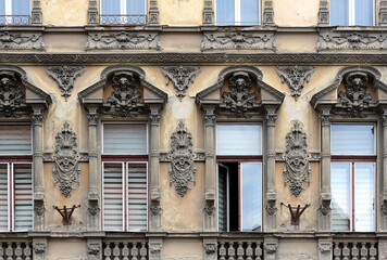 Fragment of ornate old building facade of Brasov, Romania