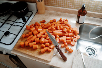 Freshly Chopped Carrots on a Kitchen Countertop During Meal Prep