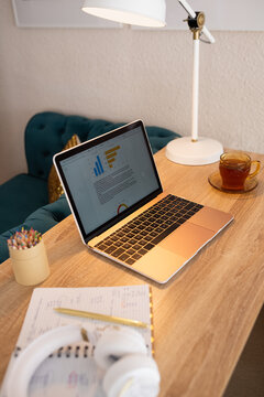 Computer with financial analytics on screen