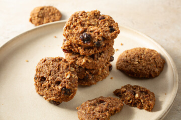 A view of a stack of gluten-free, dairy-free soft oatmeal raisin cookies.