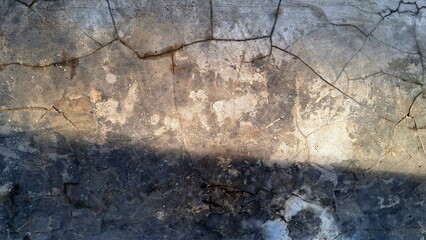 Weathered grunge concrete wall with distressed cement texture, rough aged stone surface for design elements