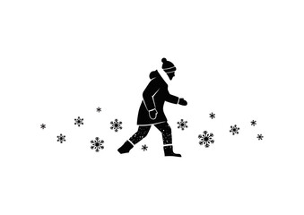 Fototapeta premium A black and white icon of a person in a winter coat and hat walking through falling snowflakes on a cold day