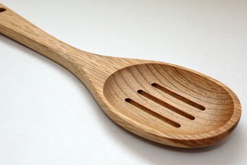 wooden spoon on a white background
