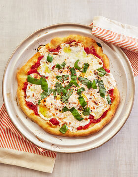 Classic Neapolitan-Style Pizza with Fresh Mozzarella and Basil