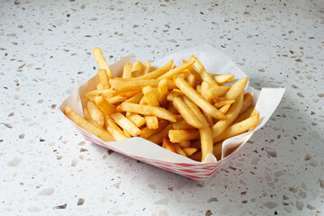 A view of a tray of french fries.