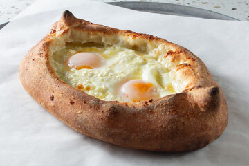 A view of a Georgian cheese bread known as khachapuri.