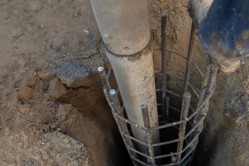 Concrete pipe installing in steel rebar structure