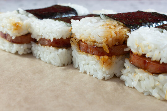 A view of a row of Spam musubi.