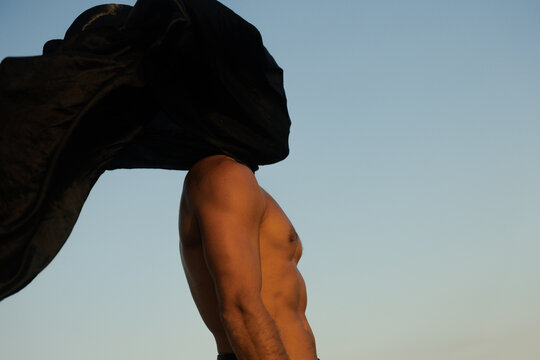 The Secretive Topless Man In The Wind