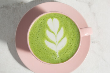 A top down view of a matcha latte. © DAVID