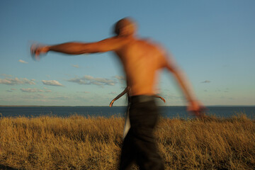 Dynamic Motion Blur Capture Couple Dancing at Sunset