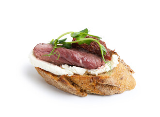 Delicious bruschetta with roast beef, cream cheese, sun-dried tomato and microgreens isolated on white
