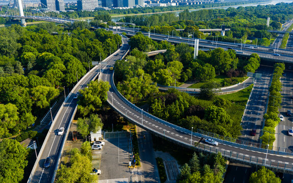 Aerial view of urban highway interchange with traffic