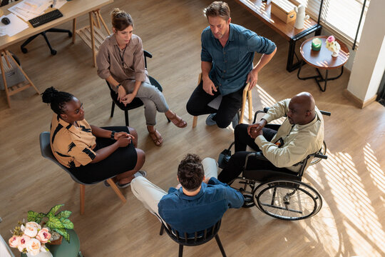 Seated in a circle for group therapy session