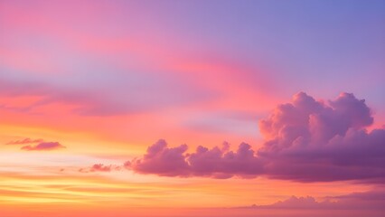 Fototapeta premium Colorful sunset sky background with soft cloud shapes, smooth gradient blend of warm orange, pink, and lavender, abstract nature glow.