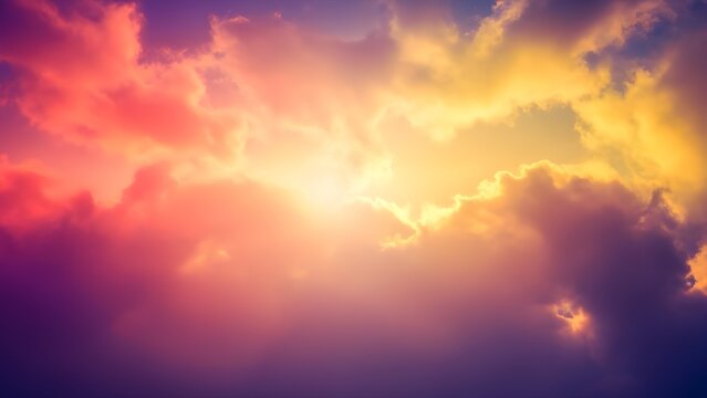 Abstract sunset sky background with radiant colors blending coral, golden yellow, and violet, cloudlike diffusion and natural glow.