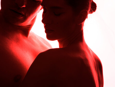 Silhouette of couple. Couple in love. Sensual. Man and woman. Happiness. Comfort. Marriage. Vacation