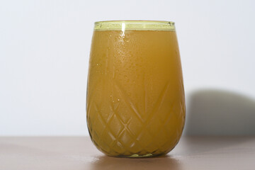 Orange Juice in a Pineapple-Shaped Glass