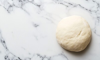 Raw dough ball preparing for baking on a white marble countertop. Food preparation, baking ingredient, cooking process