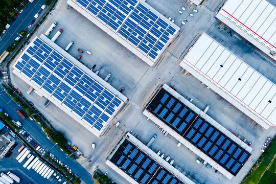Aerial View of Logistics Park Rooftops with Solar Panels