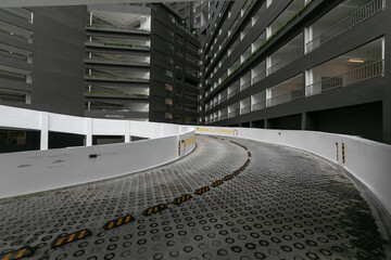 Curved Parking Garage Ramp In Modern High Rise Building