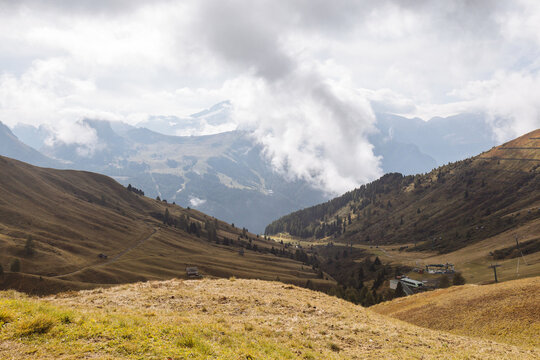 Scenic Mountain Landscape With Clouds and Rolling Hills in Autumn