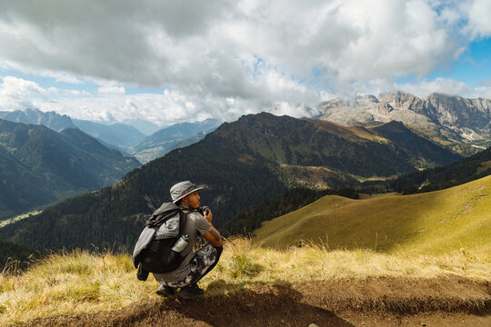Hiker Enjoying Breathtaking Mountain Views in the Dolomites