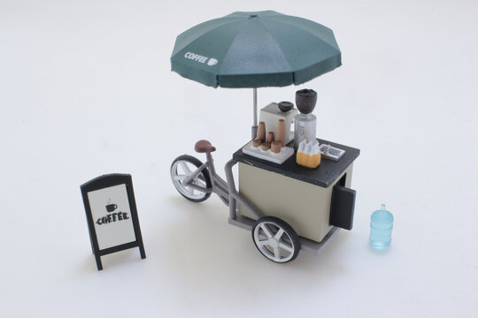 Mini Coffee Cart With Umbrella and Playful Miniature Figures in Street Scene