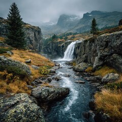 Waterfall cascading through rocky terrain under overcast sky