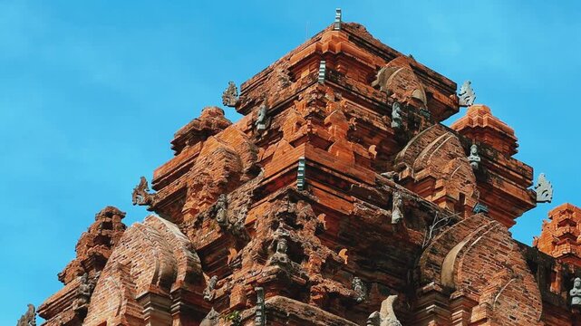 Nha Trang, Vietnam - September 17, 2025: View of the Po Nagar Cham Tower Complex, dedicated to Hindu and Buddhist deities. Close-up of the ancient temple towers. Legacy of the Champa civilization.	